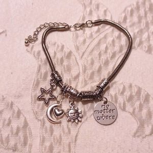 Silver tone charm bracelet
